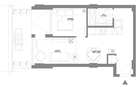 a floor plan of a house with a bedroom and a living room